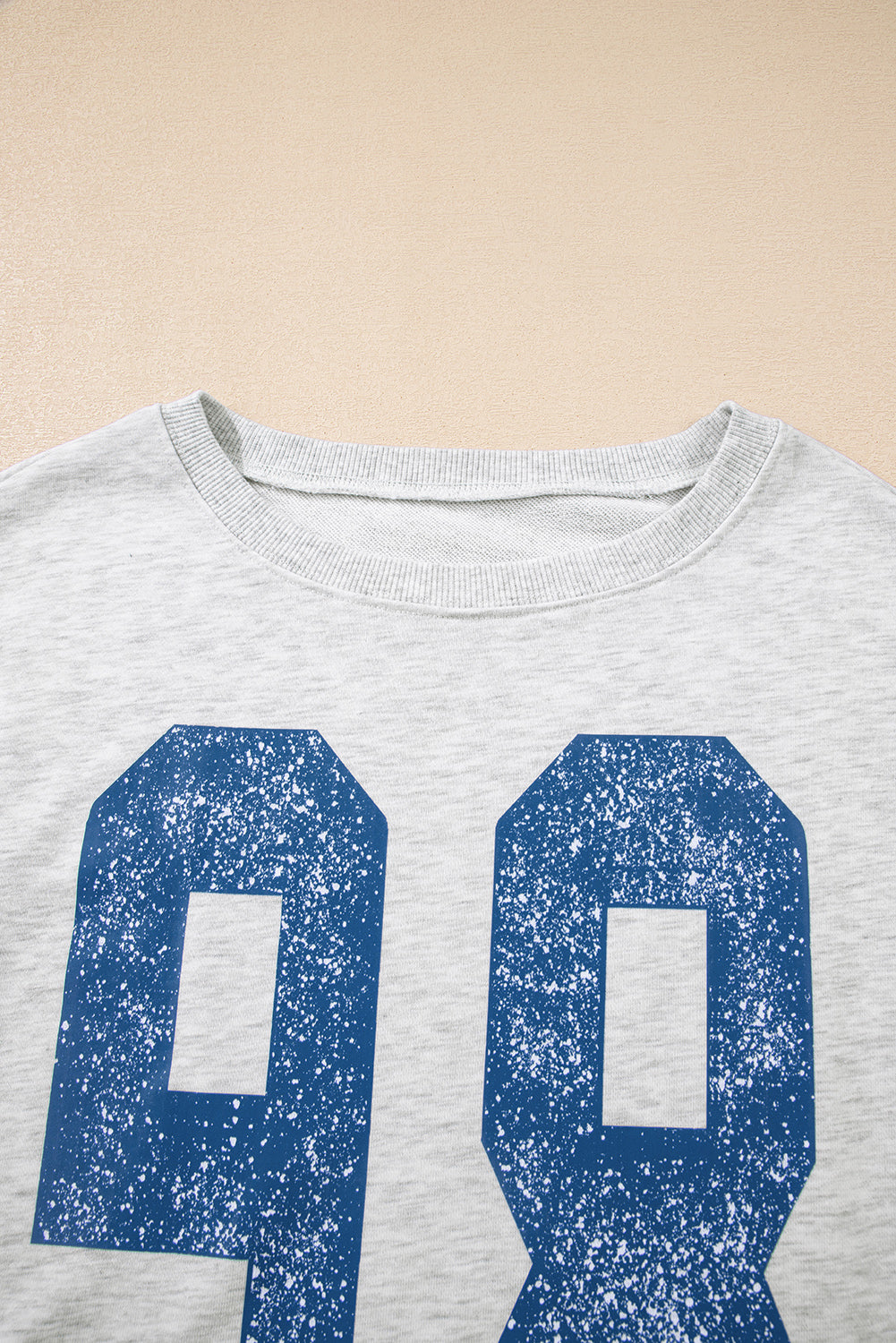 Light Grey Faded Varsity Print Loose Pullover Top